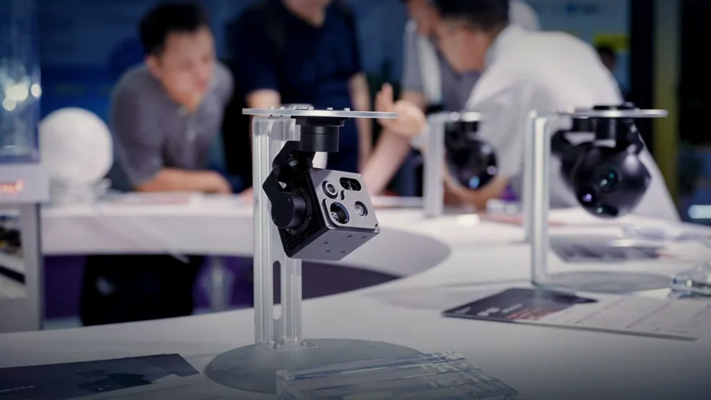 HITS camera payloads on display stands at an industry exhibition