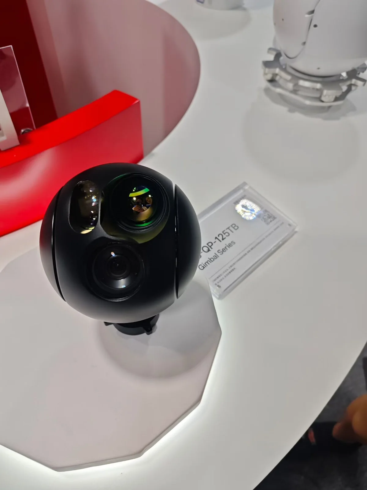 HITS QP-125TB gimbal camera pod with a daylight lens and a thermal channel in a spherical housing