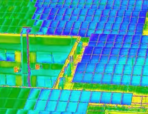 False-colour thermal palette view of a solar installation captured by a HITS imaging payload