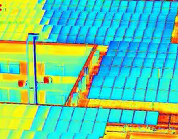 Rooftop solar array seen through the high-contrast rainbow palette