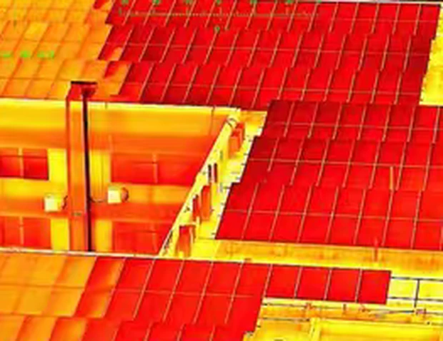 Rooftop solar array seen through the lava thermal palette