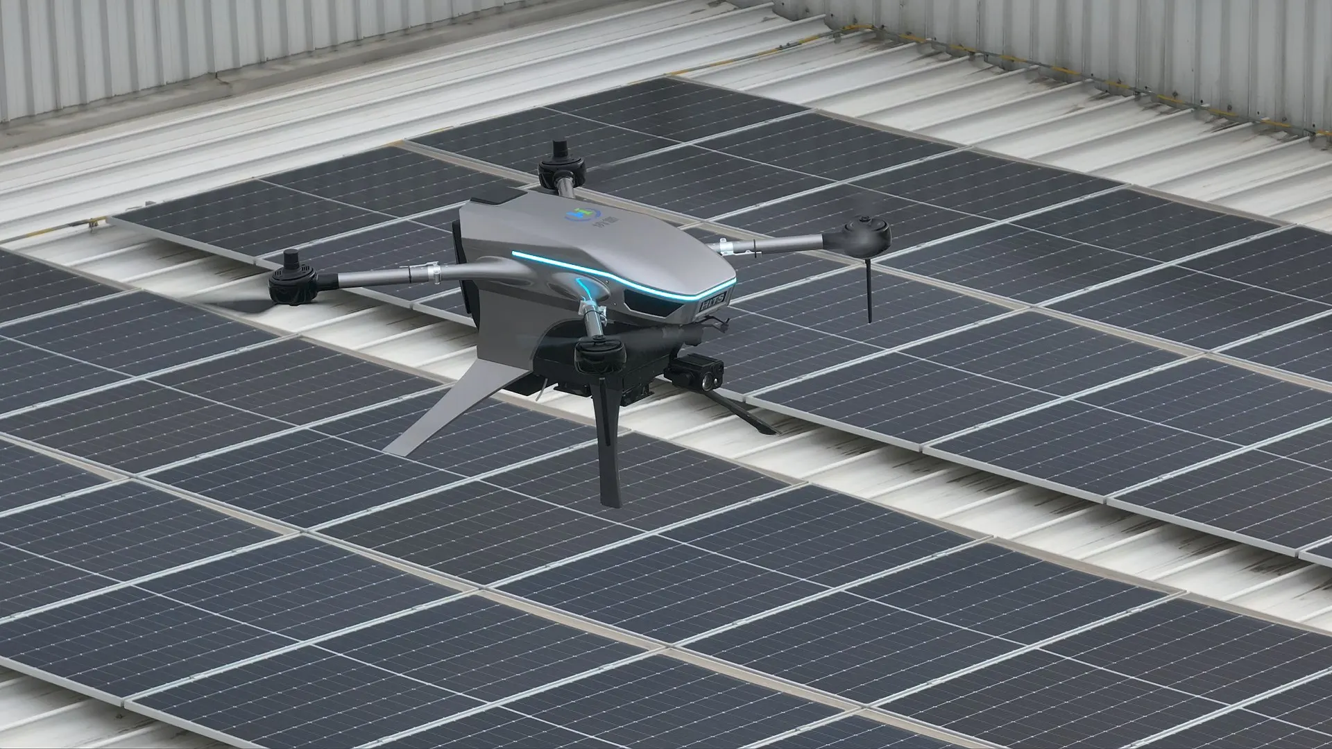 VTOL fixed-wing UAV carrying a gimbal payload over a solar array