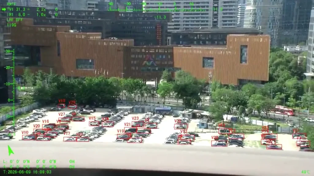 HITS payload video frame showing automated vehicle detection with an individual track identifier on each vehicle