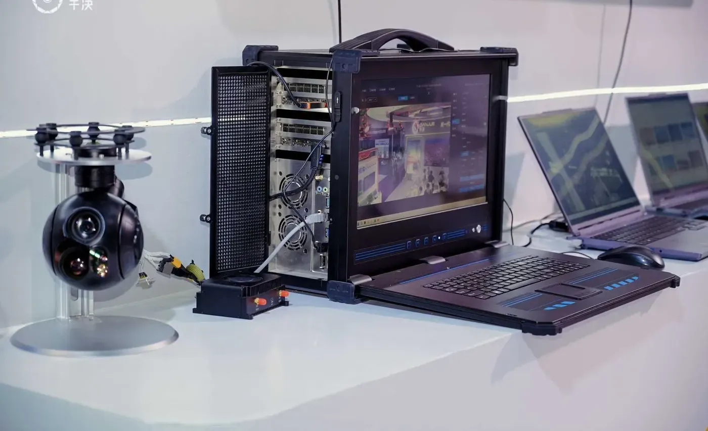 HITS gimbal camera connected by cable to a rugged ground station laptop and display showing live video
