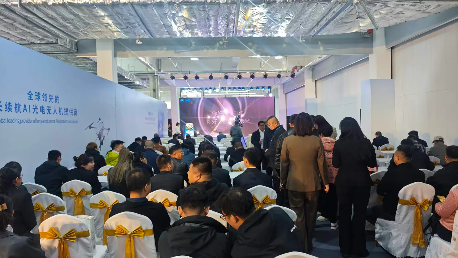 Guests seated in the event hall at the HITS Mudanjiang opening