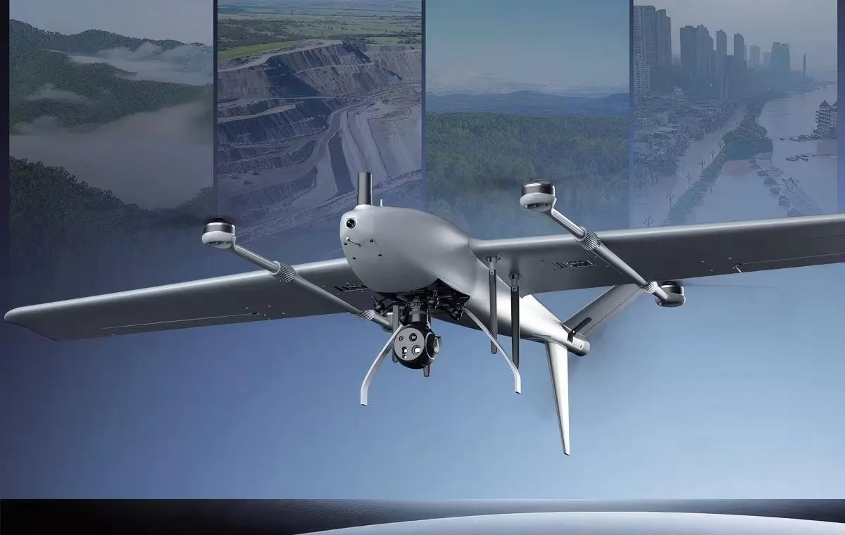 VTOL fixed-wing UAV carrying a HITS camera payload above survey, mining, forestry and disaster-response imagery